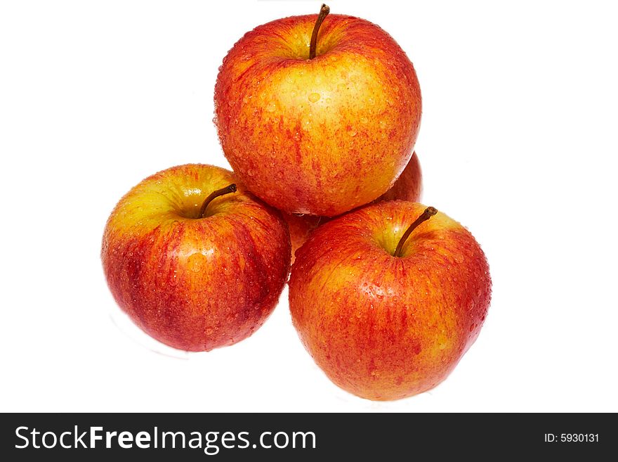 Wet red apples isolated on white background