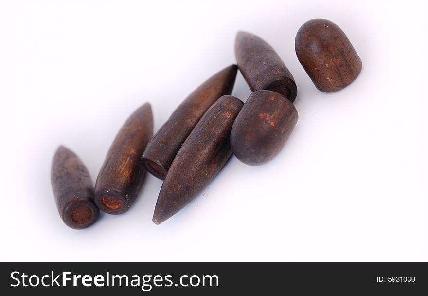 Macro set of old used 7,62 mm bullets of AK47 and of 9 mm TT isolated on white. Macro set of old used 7,62 mm bullets of AK47 and of 9 mm TT isolated on white