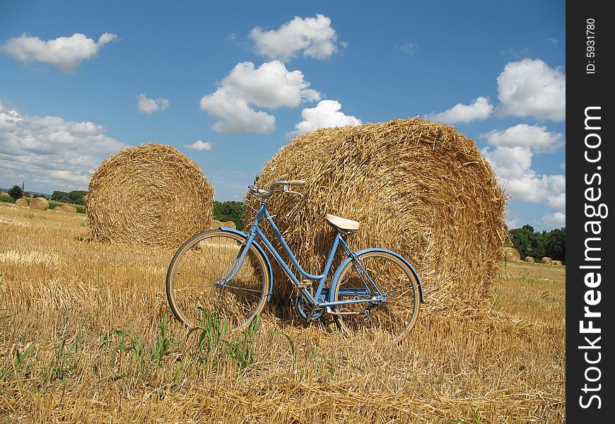 Classic retro bike with hay bales