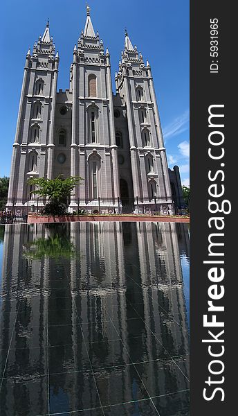 The Mormon Temple in Salt Lake City, Utah, and its reflection.
