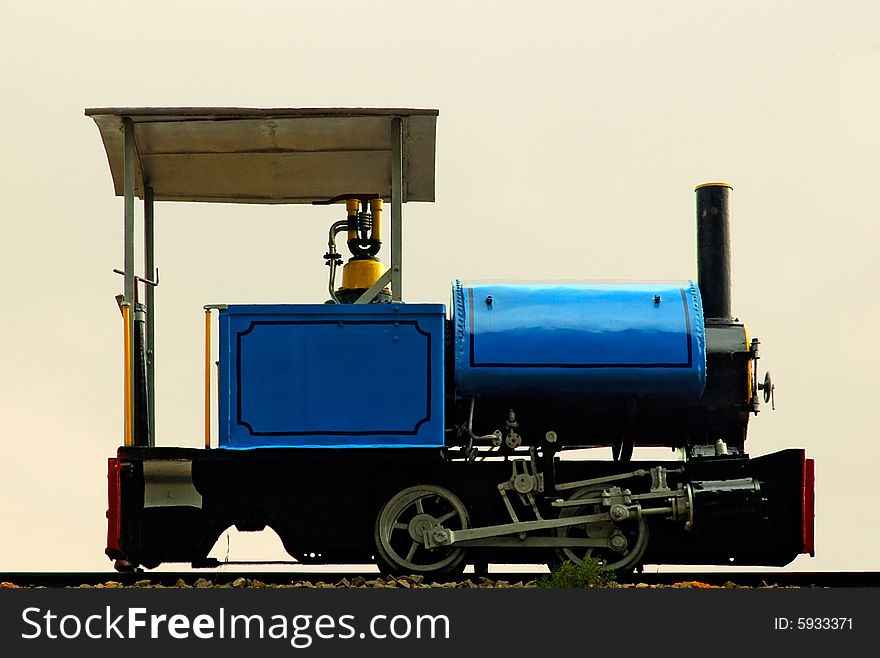 Ancient blue locomotive maybe from the 19th century. Ancient blue locomotive maybe from the 19th century