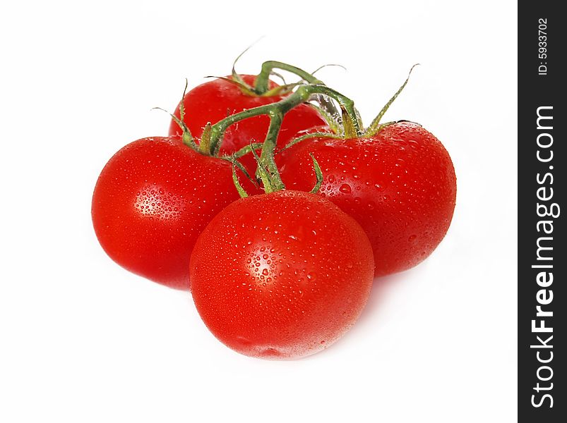 Cluster of red tomatoes isolated on white