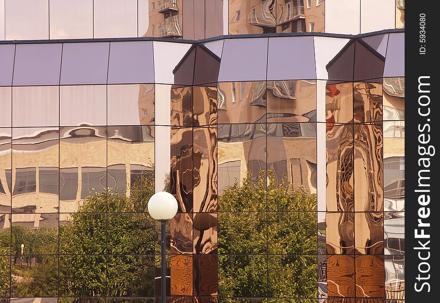 Building windows reflecting surrounding archiecture. Building windows reflecting surrounding archiecture.