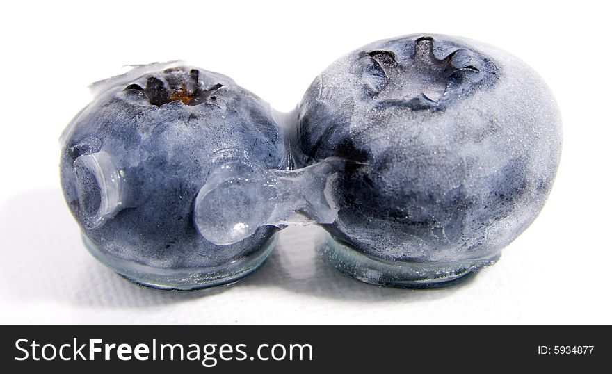 Frozen blueberries pair  close up