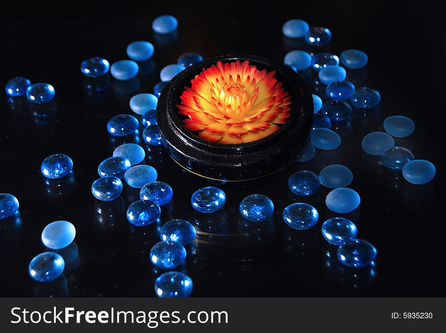 Candle lotus with blue marble. Candle lotus with blue marble