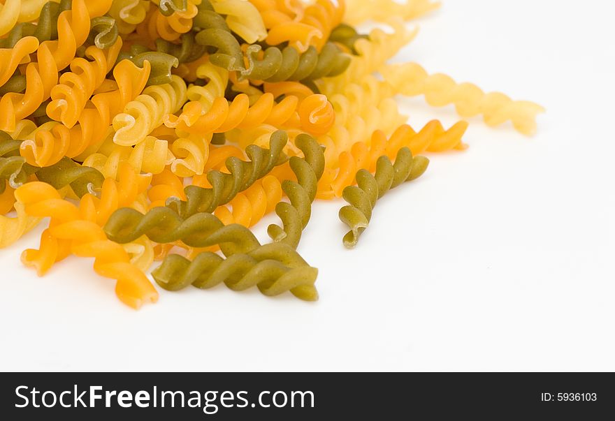 Dried pasta in 3 colors isolated on a white background