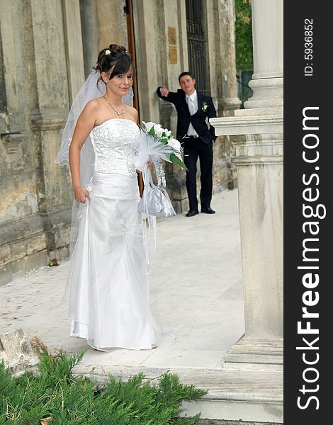 Beautiful bride and groom huging outdoor