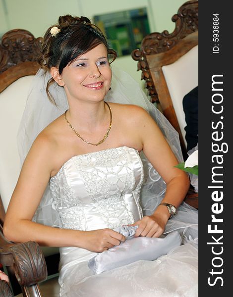 Beautiful bride sitting on chair