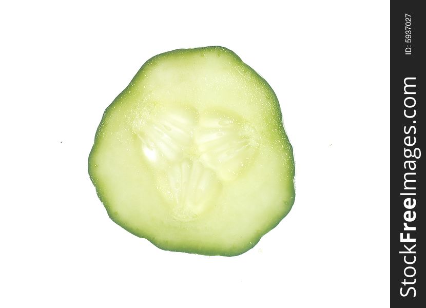 A thin slice of Cucumber on a clean white background