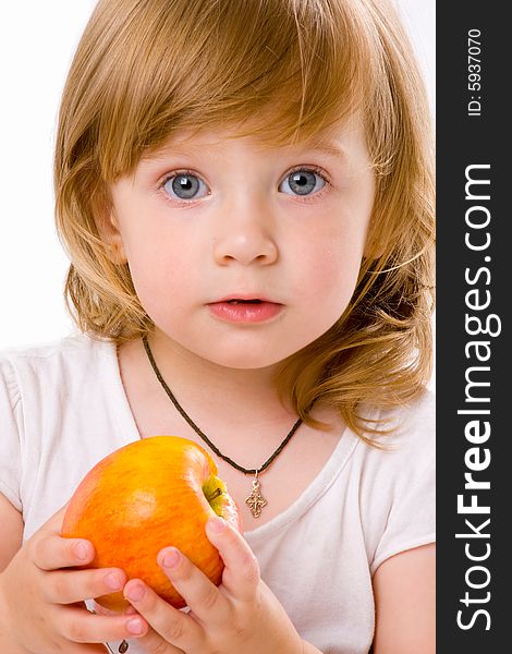 Close-up of pretty girl eating an apple, isolated over white