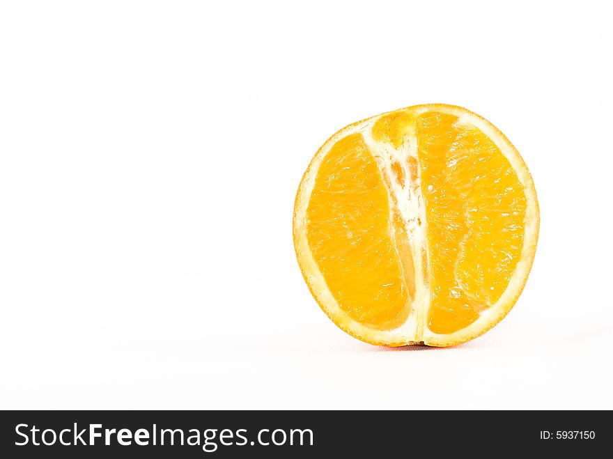 Still life of a halved orange isolated on white. Still life of a halved orange isolated on white