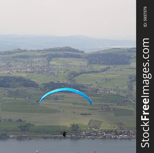 Paragliding overlooking Lake Lucerne in Switzerland