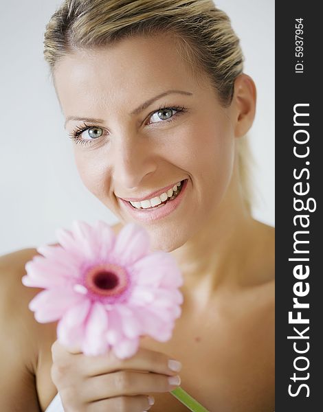 Portrait of young woman with flower. Portrait of young woman with flower