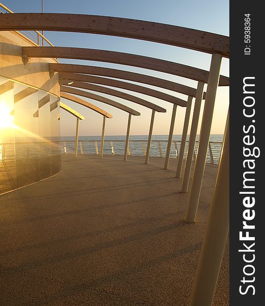 A beautifull shot of a dock at the sunset hour. A beautifull shot of a dock at the sunset hour