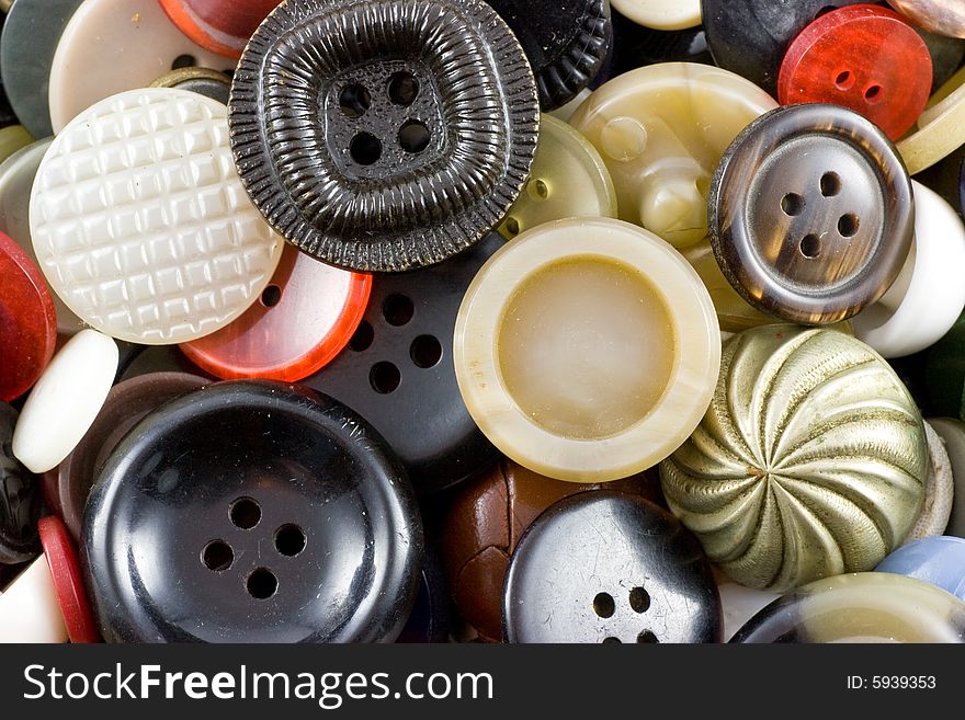 Assorted vintage sewing buttons background