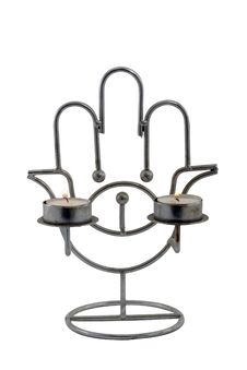 Two Candles, Which Burn In Candlestick- Hamsa Hand Royalty Free Stock Image Two Candles, Which Burn In Candlestick- Hamsa Hand Royalty Free Stock Image