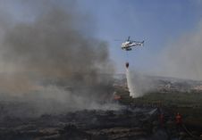 Fire With Combat Helicopter Royalty Free Stock Image Fire With Combat Helicopter Royalty Free Stock Image