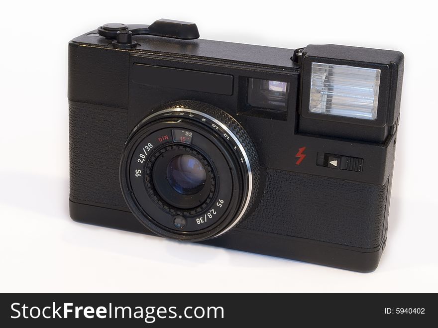 Old film camera isolated on a white background