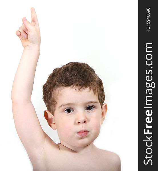 3 year old boy pointing up with his finger