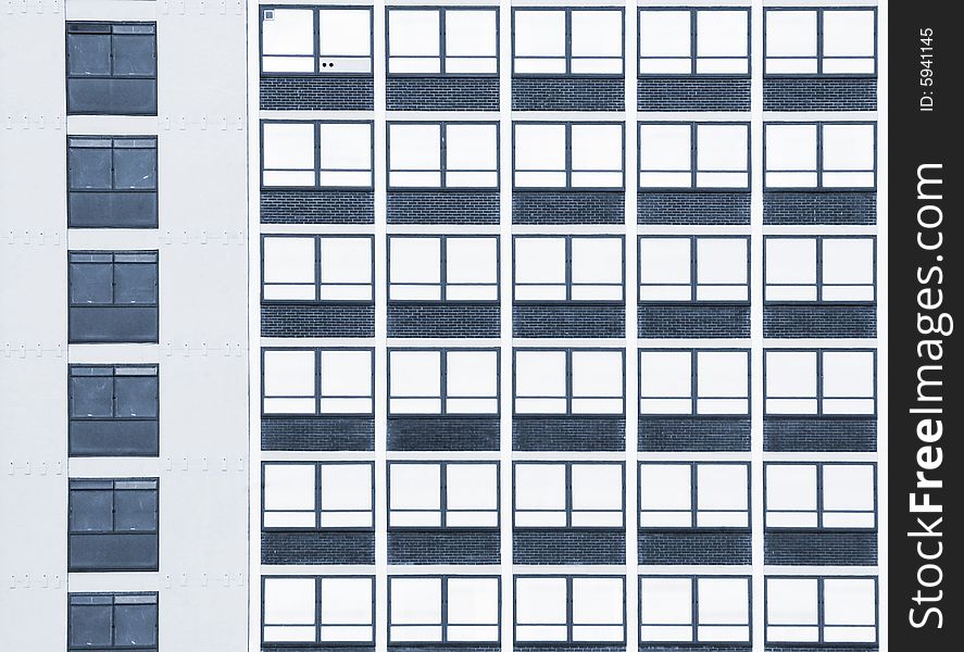 Detailed view of windows in apartment building. Detailed view of windows in apartment building