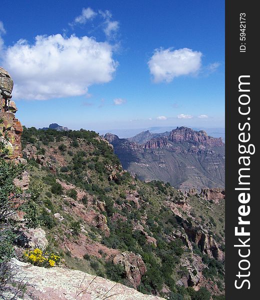 Mountains and cliffs and sky and clouds