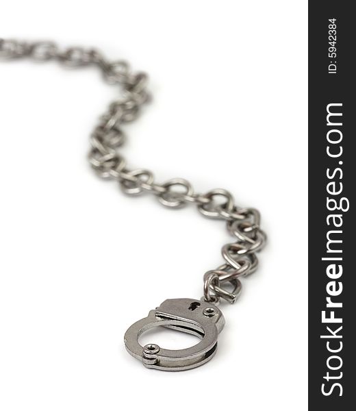 Chain and handcuffs isolated on white background