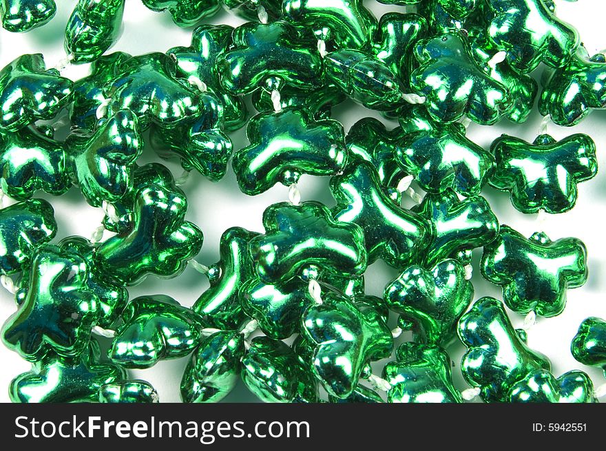 A closeup photograph of clover beads. A closeup photograph of clover beads
