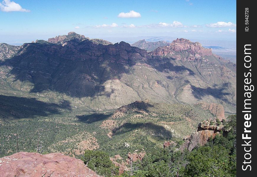 Desert mountain vista with cloud shadows