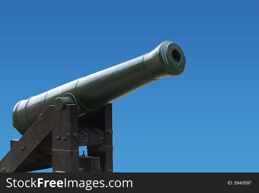 Old gun isolated on blue and clipping path included