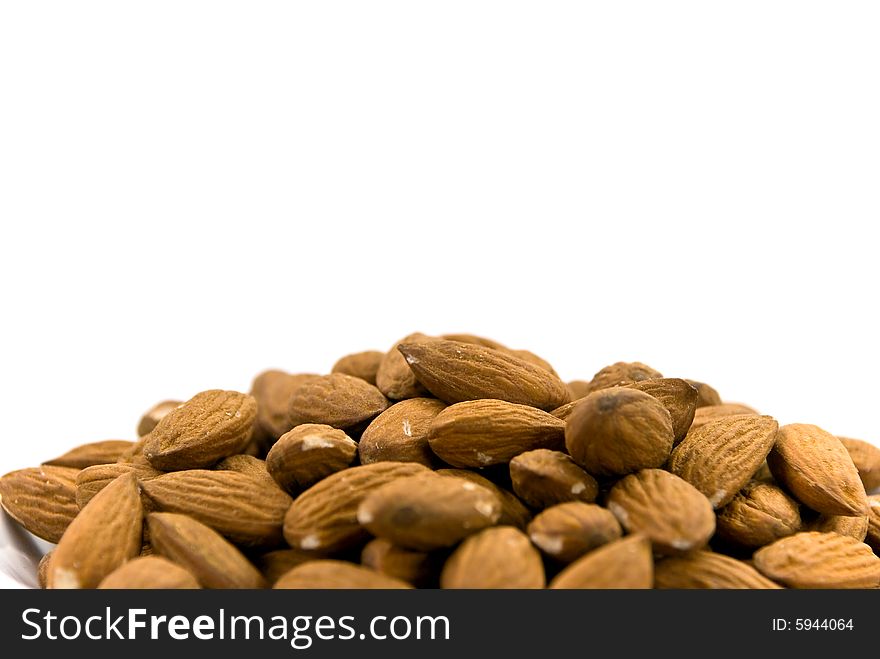 Raw almonds - isolated on white.