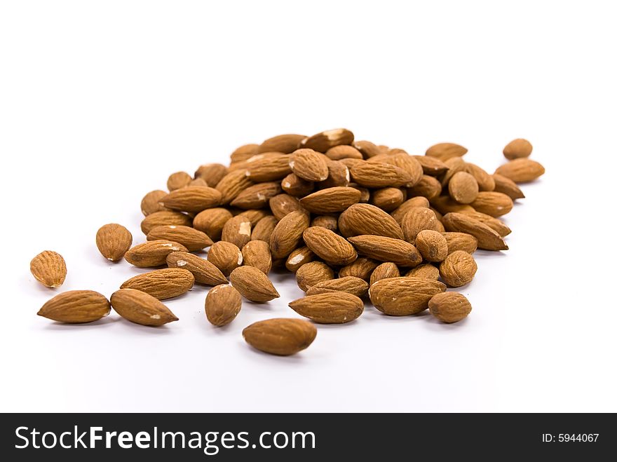 Raw almonds - isolated on white.