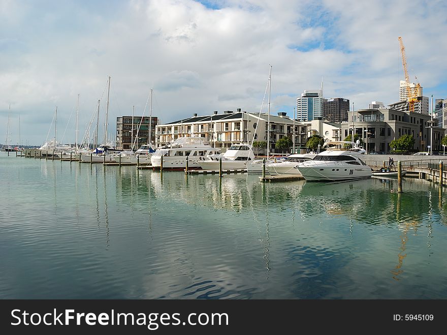 Yachts at Auckland Harbor with blue sky background