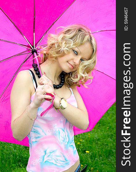 Beautiful girl with black necklace and umbrella. Beautiful girl with black necklace and umbrella