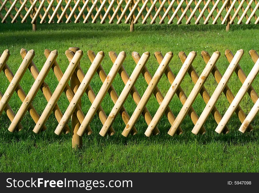 The small wooden fence fencing off places on the camping. The small wooden fence fencing off places on the camping