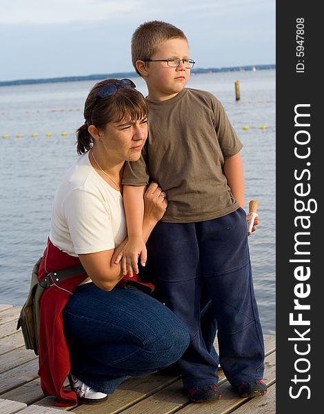 Mother with the son they stand on the platform. Mother with the son they stand on the platform