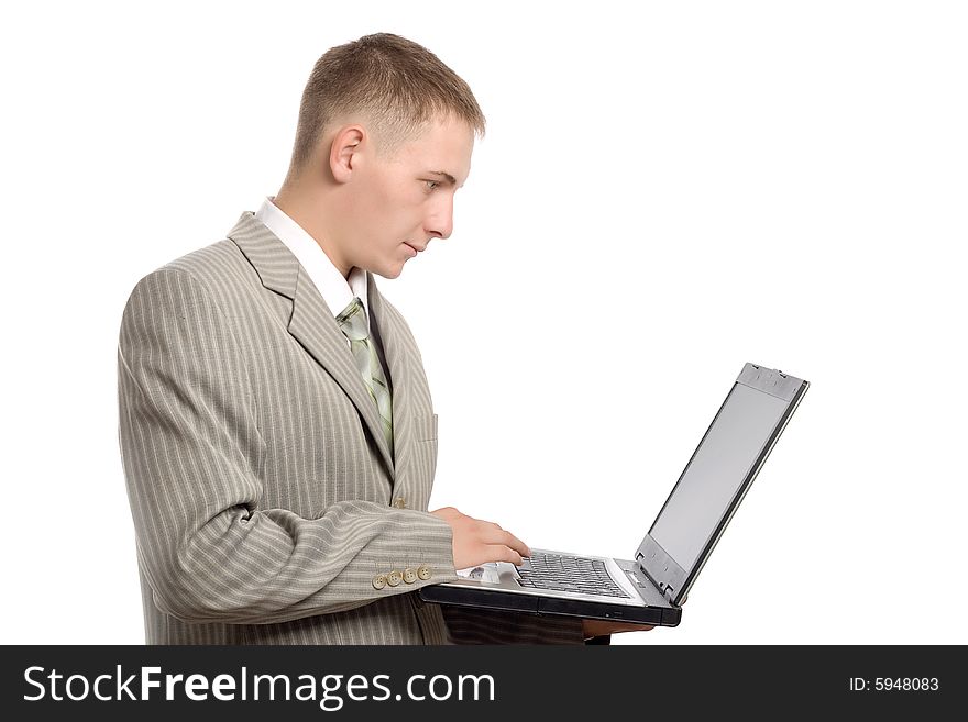 Young businessman working with notebook, white background