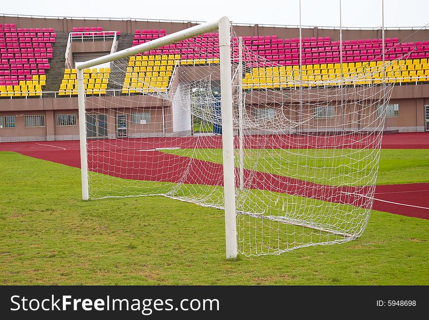 This is a football goal in a sport ground.