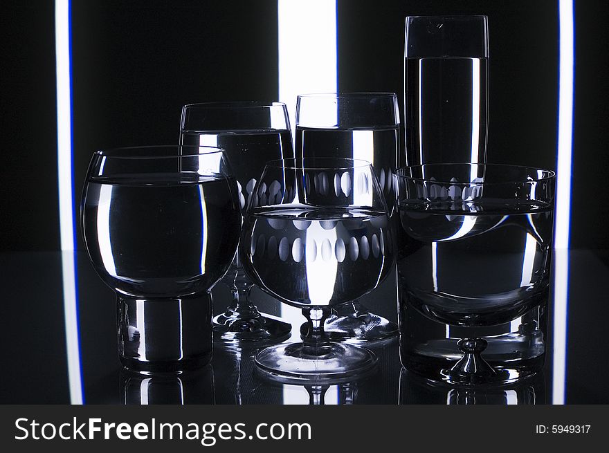 Glasses with water with background