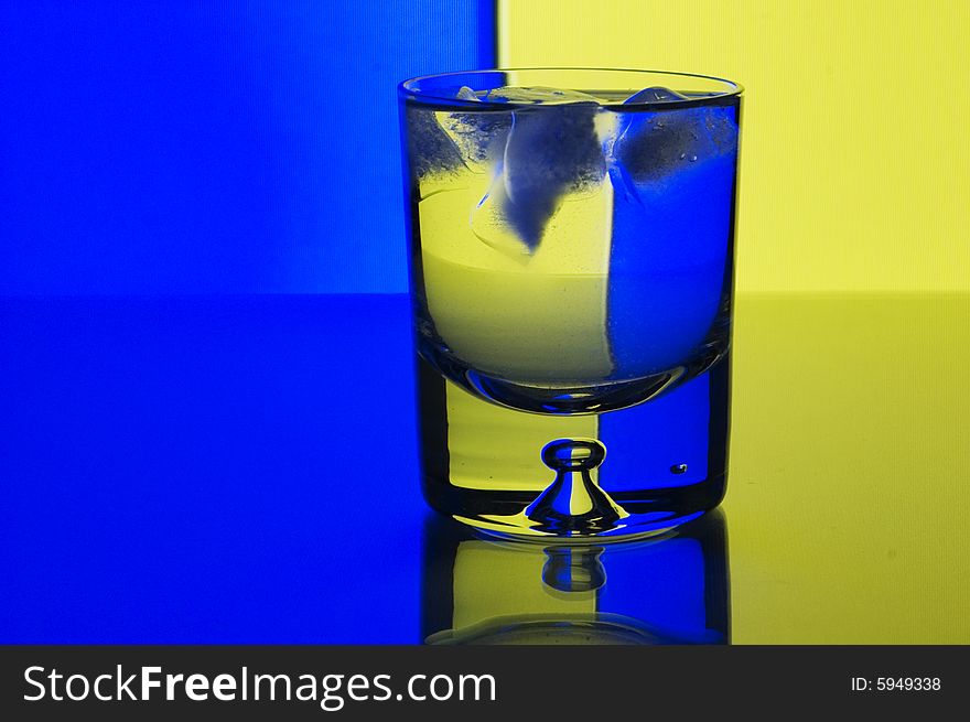 Glass with ice with background