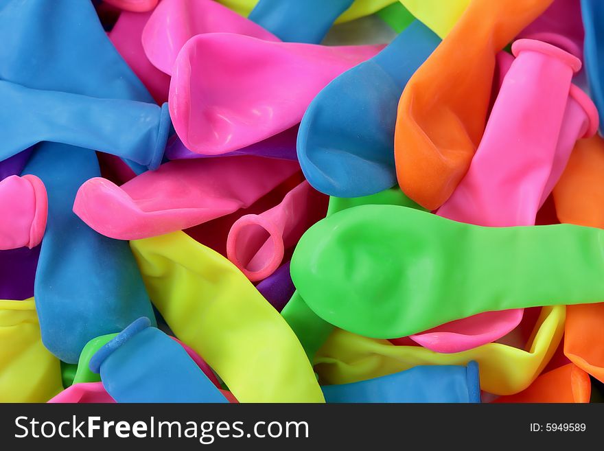 Neon colored water balloons perfect for a background