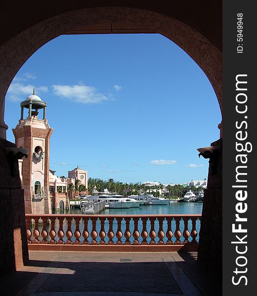 The framed view of Paradise Island harbour and the resort building (The Bahamas). The framed view of Paradise Island harbour and the resort building (The Bahamas).