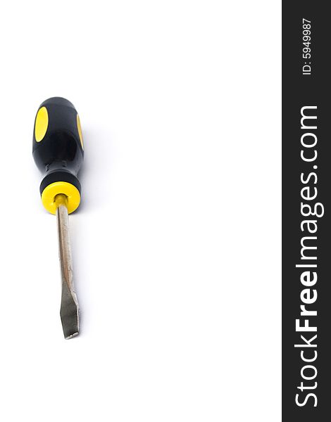 Yellow and black handled screwdriver on white background. Yellow and black handled screwdriver on white background