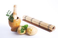 Mortar And Pestle With Herbs Stock Image