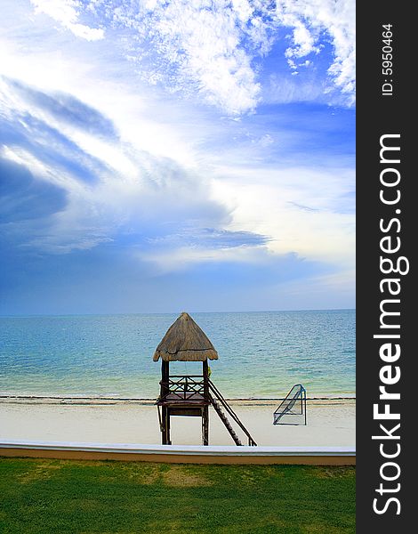 Thatched roof lifeguard stand on tropical Caribbean beach