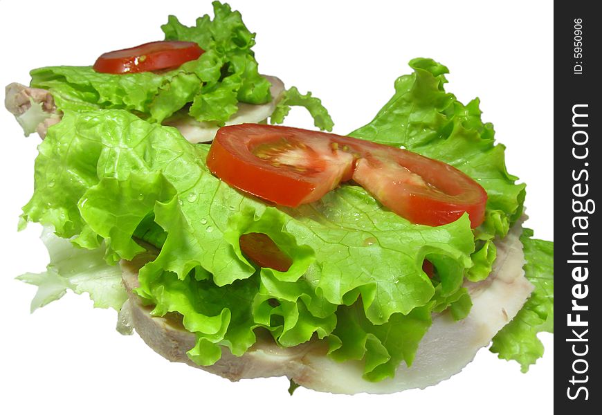 Hamburger composed of salad, bacon and tomatos isolated on a white background. Hamburger composed of salad, bacon and tomatos isolated on a white background