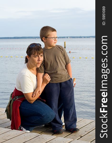 Mother with the son they stand on the platform. Mother with the son they stand on the platform