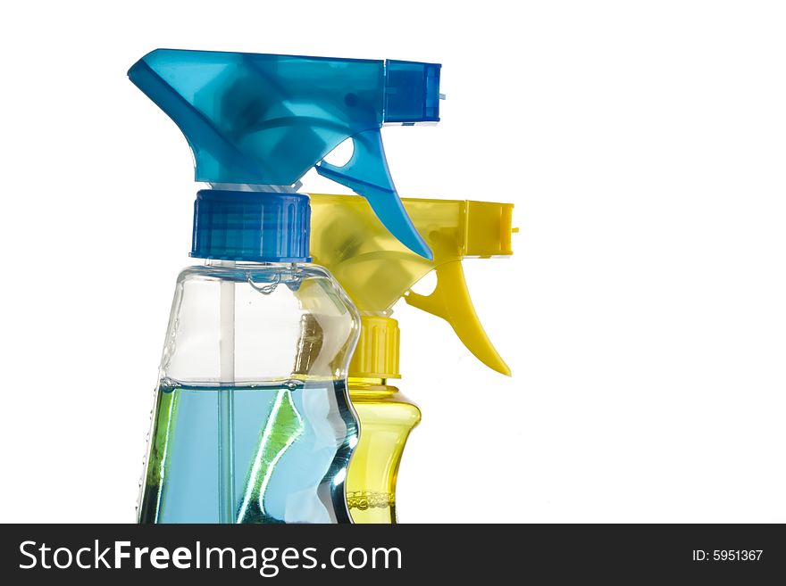 Blue and yellow trigger spray bottles