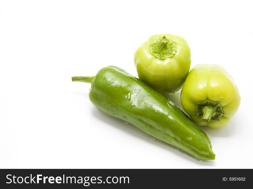 Isolated three sweet green peppers. Isolated three sweet green peppers