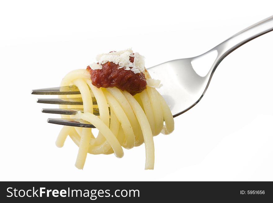 Spaghetti on a fork over white background