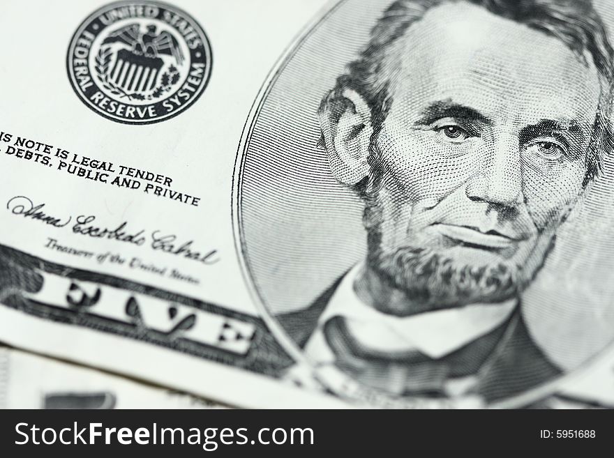 Closeup of lincoln on five dollar bill. Closeup of lincoln on five dollar bill